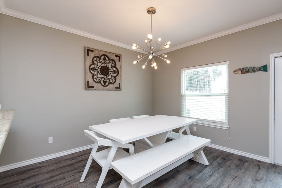 Gather around your bright dining table where modern style meets comfort, perfect for sharing meals and making memories together.