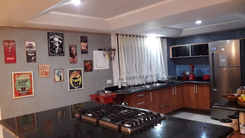 House, Multiple Beds | Private kitchen | Fridge, microwave, oven, cookware/dishes/utensils