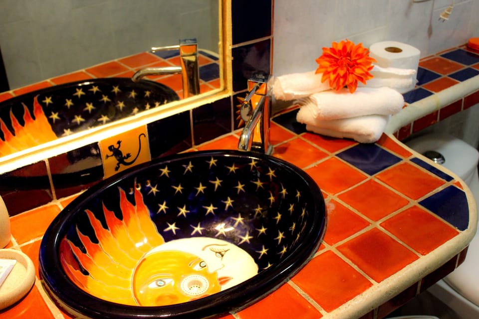 Bathroom is decorated with mexican talavera
Viva Maria