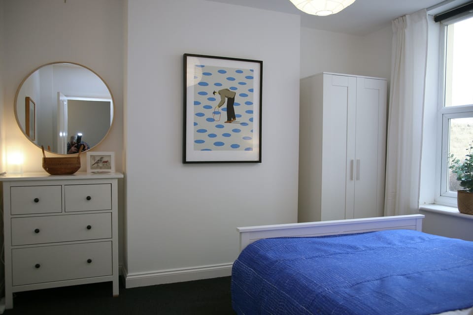 Bedroom  - Quiet and relaxing with a blackout blind as well as curtains.