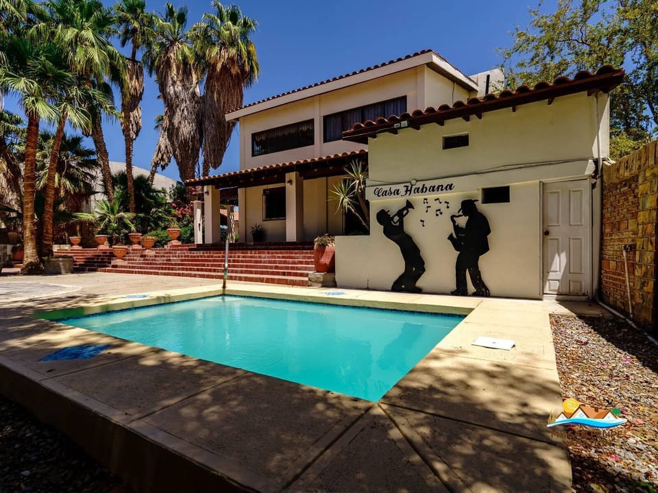 Relax by the beautifully designed modern pool at Casa Habana in San Felipe Baja California — outdoor luxury with ocean views.