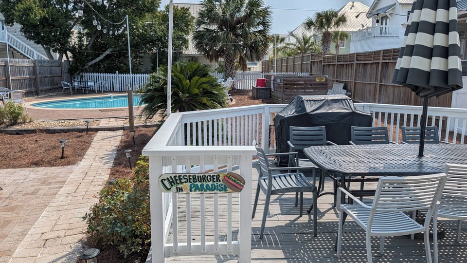 Cook a cheeseburger in paradise on the natural gas grill.