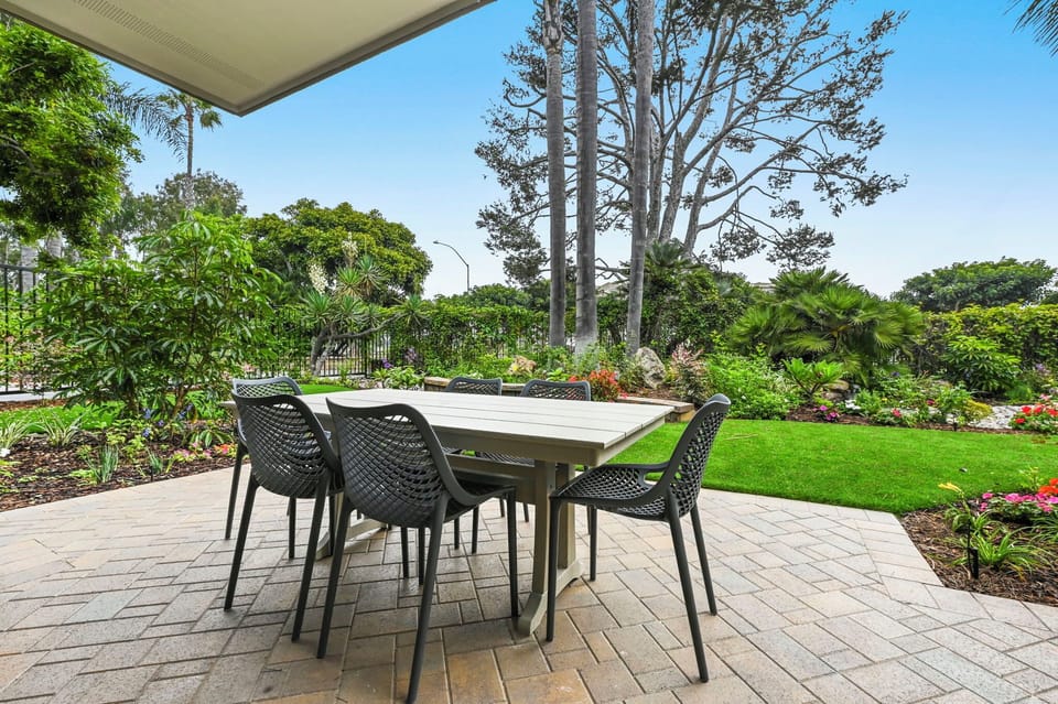 Experience outdoor living at its best with a fully renovated patio and grassy area, completed in 2025.