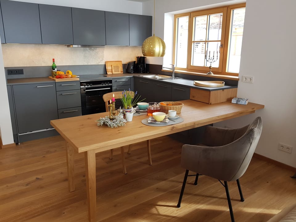 Apartment (Kaiserwinkl) | Private kitchen | Fridge, oven, stovetop, dishwasher