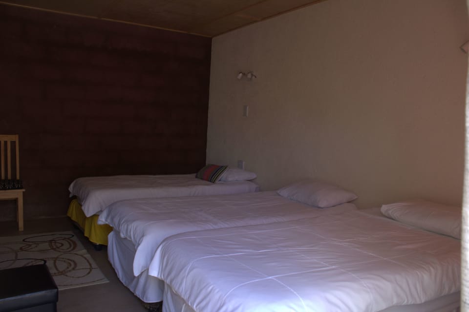 Family Room | Blackout drapes, iron/ironing board (on request), WiFi (free)