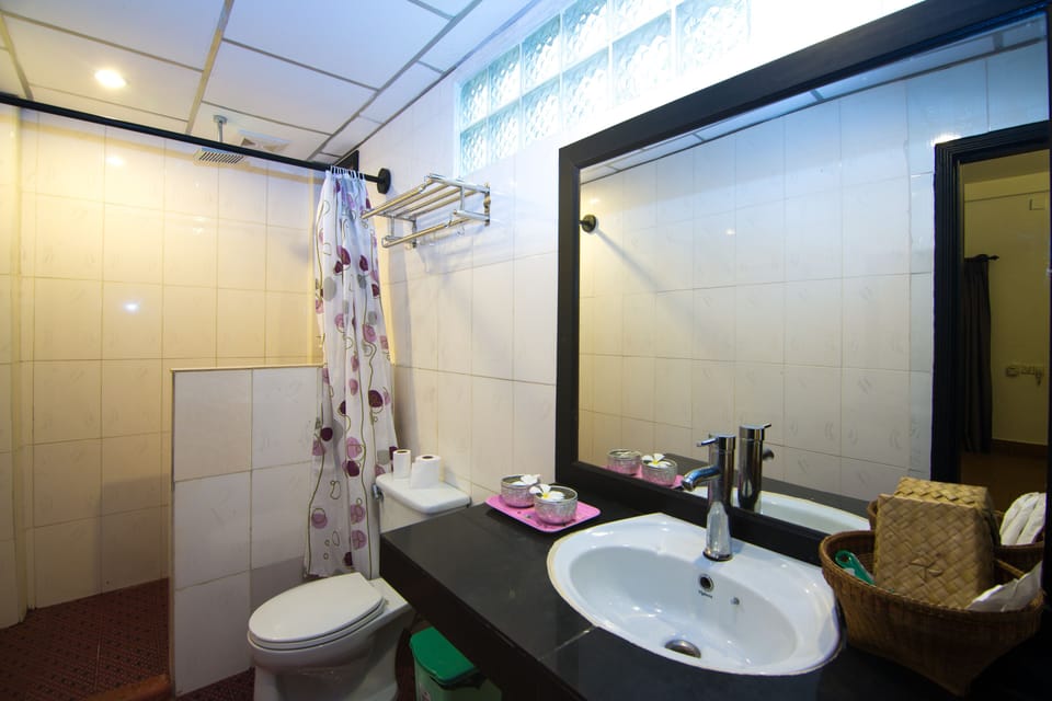 Shower, designer toiletries, hair dryer, bathrobes