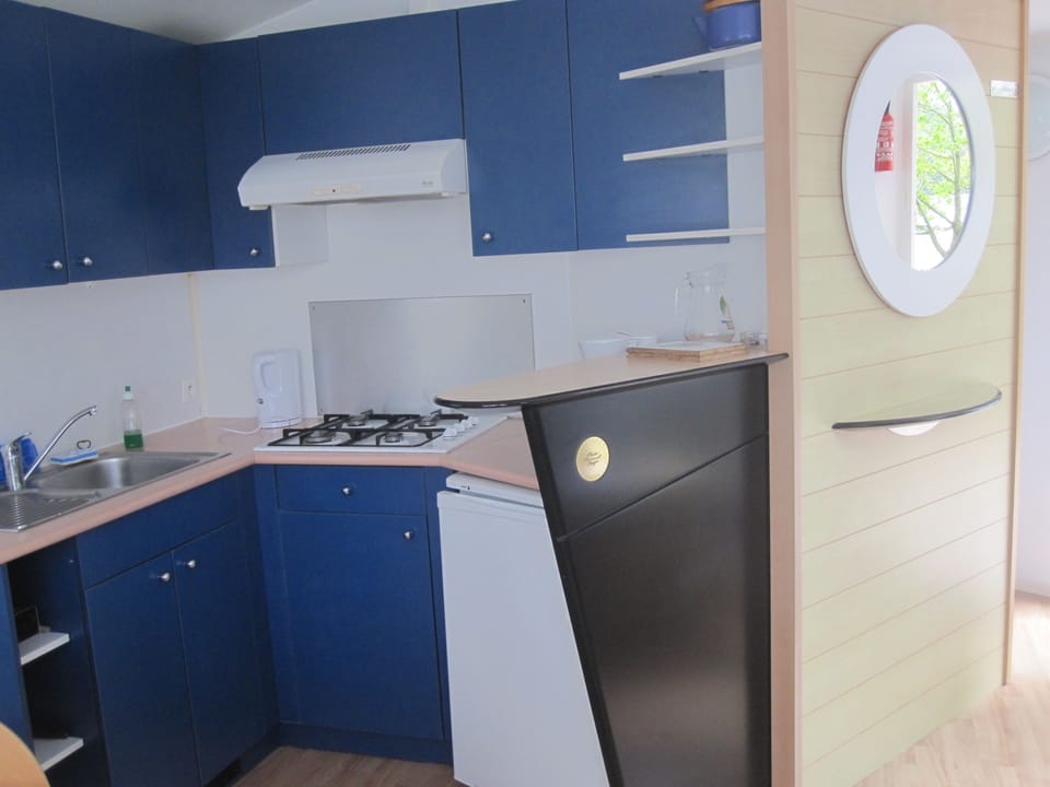 Comfort Mobile Home | Private kitchen | Full-size fridge, microwave, stovetop, coffee/tea maker