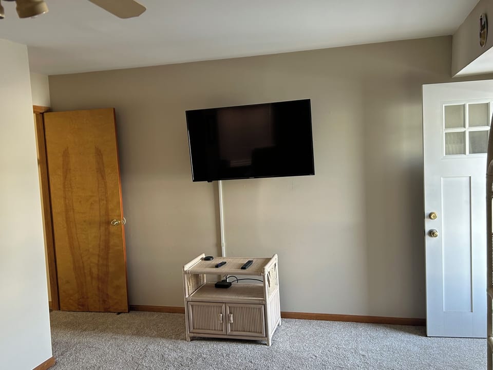 First floor family room television. 55”