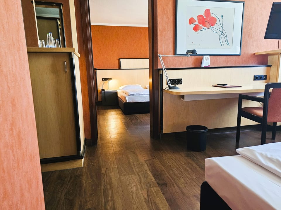 Family Room | Minibar, in-room safe, desk, laptop workspace