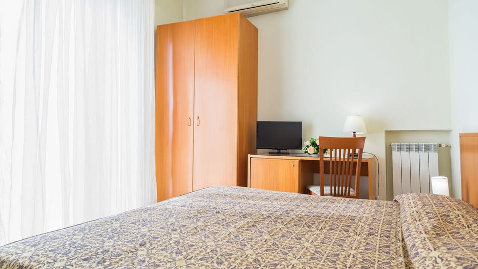 Standard Double or Twin Room, Partial Sea View | Minibar, desk, free WiFi, bed sheets