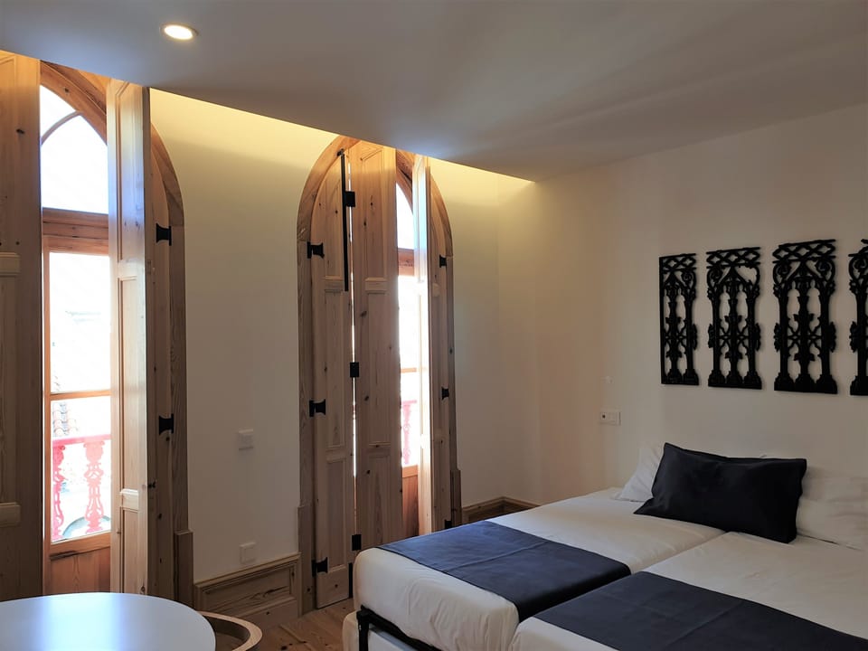 Deluxe Room, Balcony, City View | 1 bedroom, individually decorated, individually furnished, soundproofing