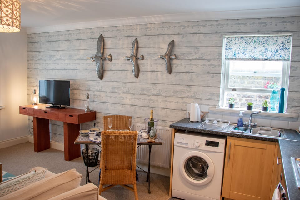 Open plan living dinning room and kitchen