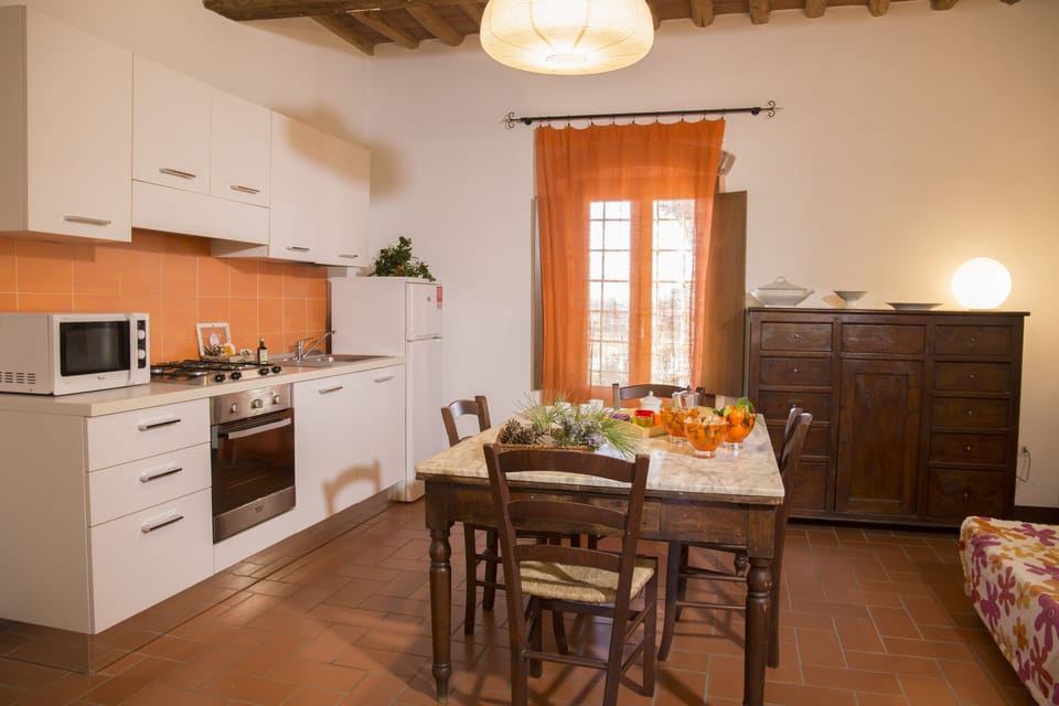 Apartment, 1 Bedroom (Verde) | Private kitchen | Full-size fridge, microwave, stovetop, dishwasher