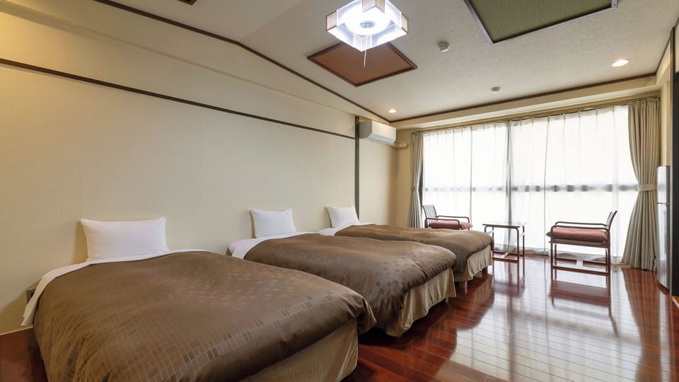 Standard Triple Room - Shower Only - Non-Smoking | WiFi (free), bed sheets