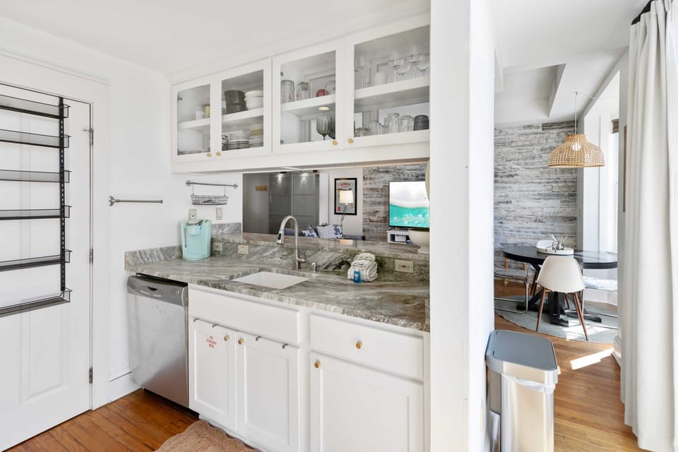 Your fully equipped kitchen features marble countertops, stainless steel appliances, and everything you need to create memorable meals during your stay.