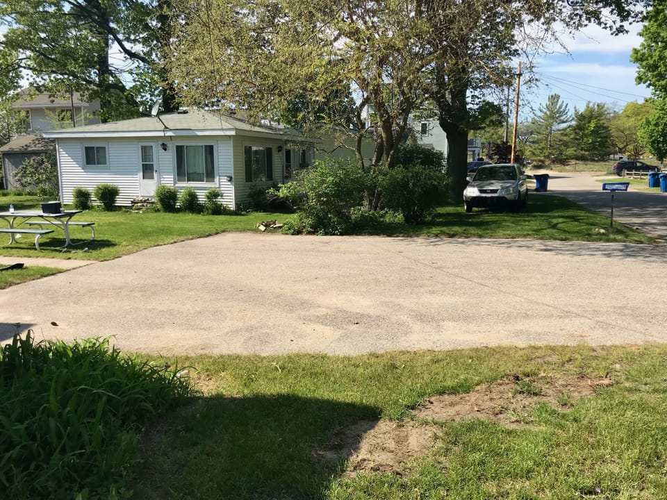 Side of house, summer time. 