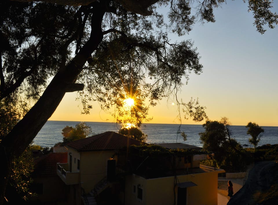 The sunset panorama and the house Angelos