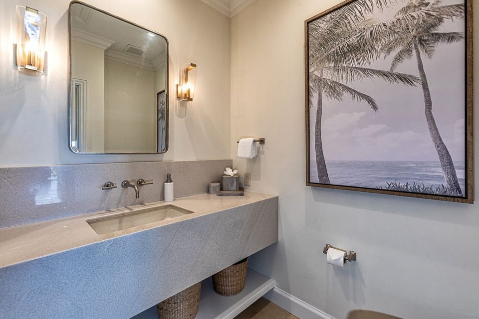Guest half bathroom off the living and dining area. 