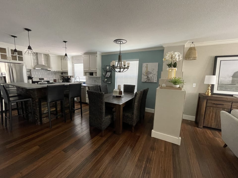 Overview of dining area and kitchen