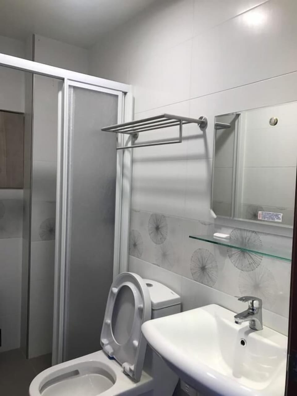 Shower, free toiletries, hair dryer, slippers