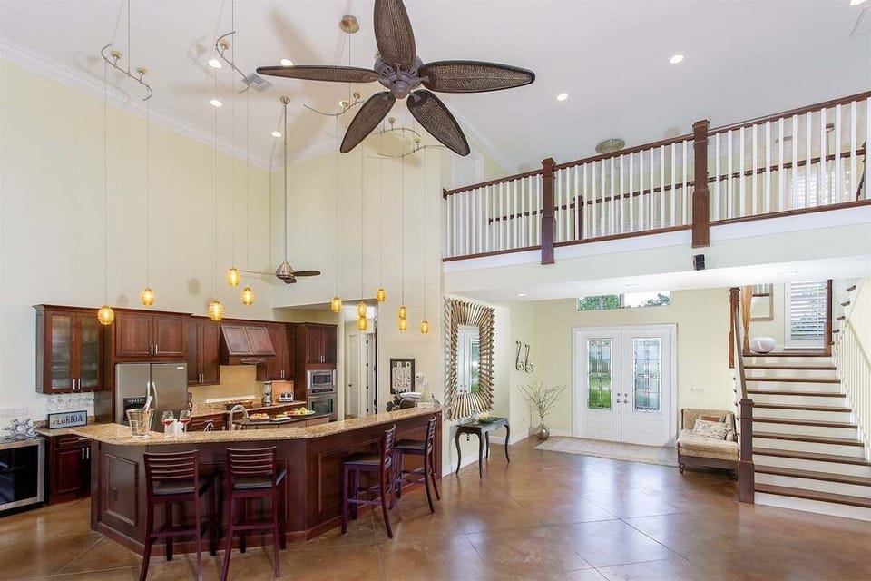 Open Living at its Finest, View from Living Room to Upstairs Cat Walk and Open Gourmet Kitchen