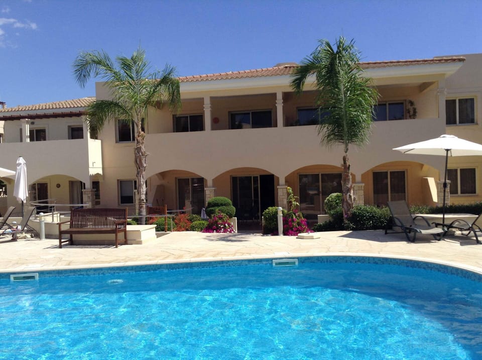 View of apartment from one of the swimming pools.