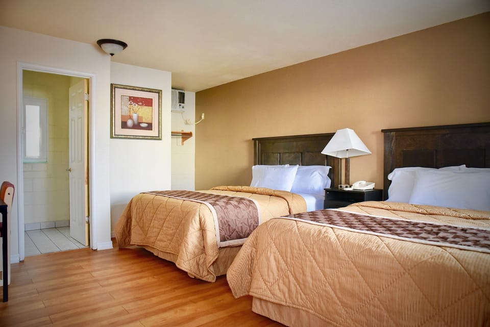 Standard Room, 2 Queen Beds, Non Smoking | Desk, iron/ironing board (on request), WiFi (free)