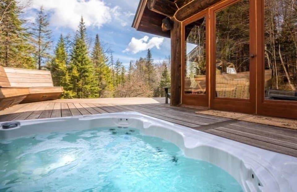Hot tub located right off sun room.  Just open door and can jump in new hot tub.