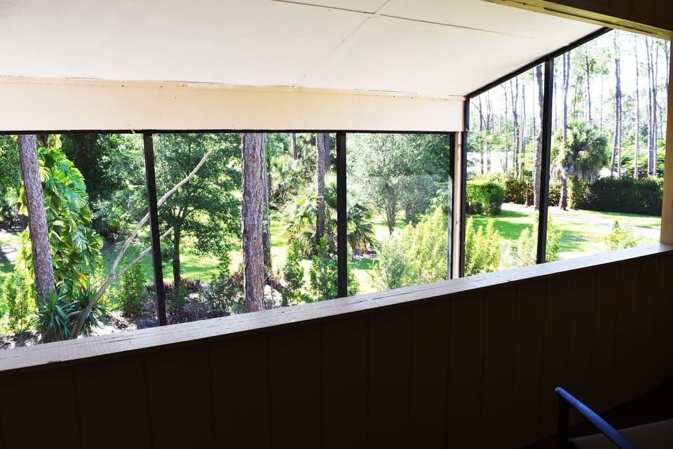 The private balcony, just off the master bedroom, provides amazing views of the lush tropical Florida landscape.  
