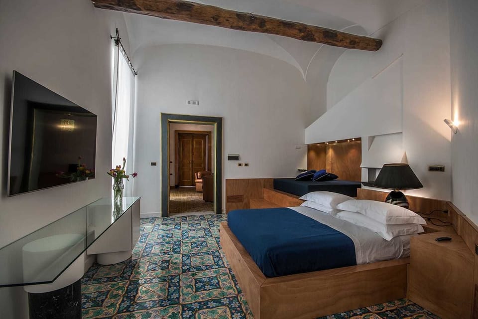 Suite (Mirella) | Minibar, in-room safe, desk, blackout drapes