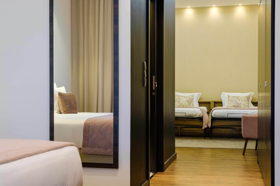 Family Room | 1 bedroom, minibar, in-room safe, desk