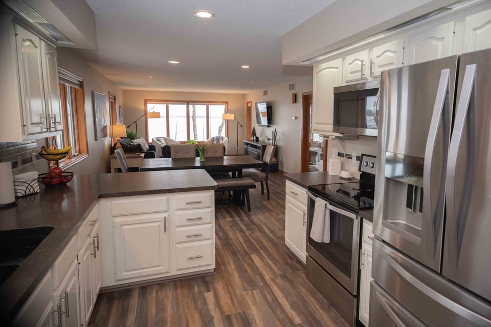 You will love this open concept kitchen living room space with a beautiful view!