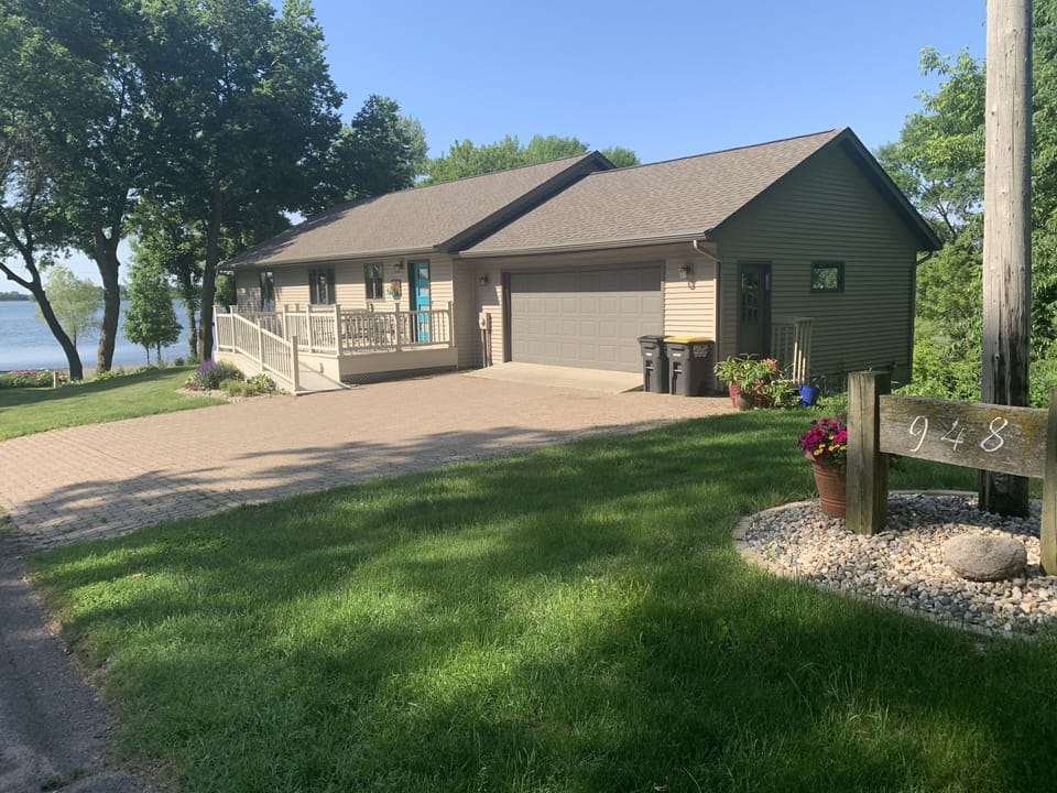 Another view of the house, where you will enter the 2 stall garage or use ramp!