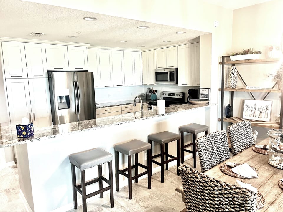 Fully equipped kitchen pots, dishes and utensils.