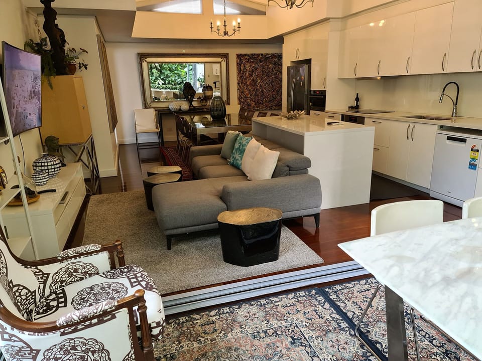 conservatory + Kitchen and living area.