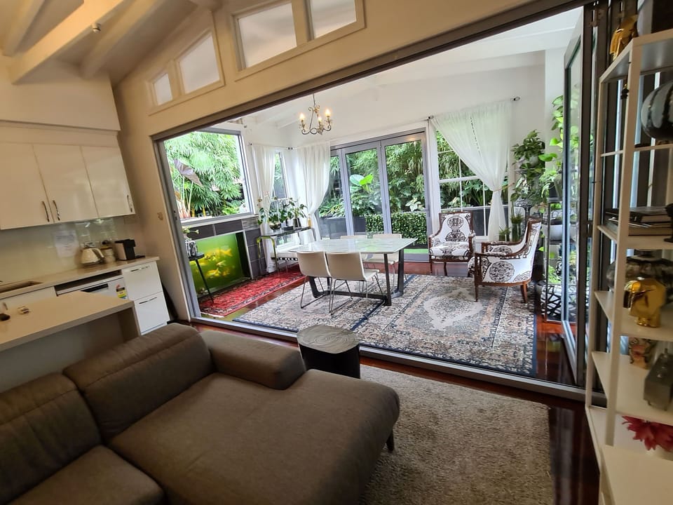 conservatory + Kitchen and living area.