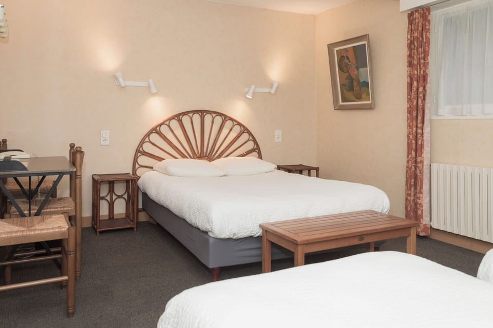 Basic Quadruple Room | Minibar, desk, iron/ironing board, free WiFi