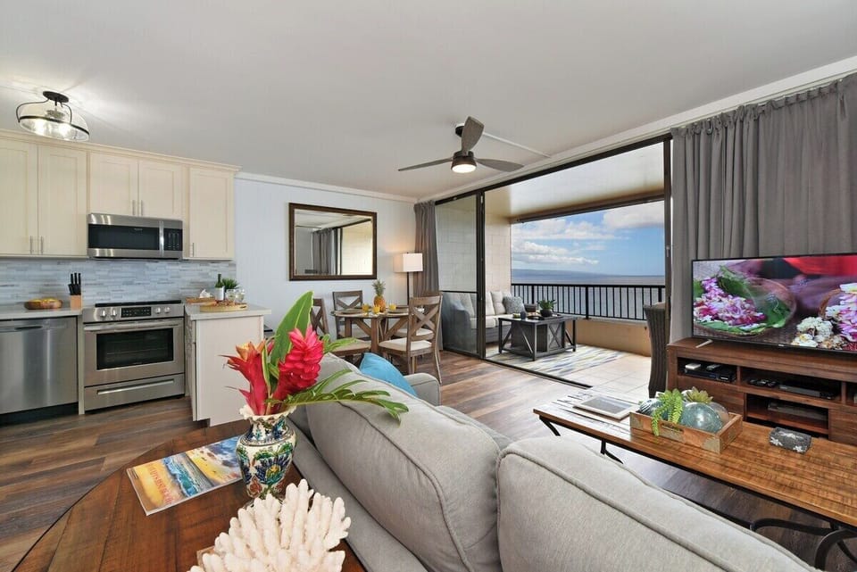 Open-concept kitchen, living and dining area with private lanai