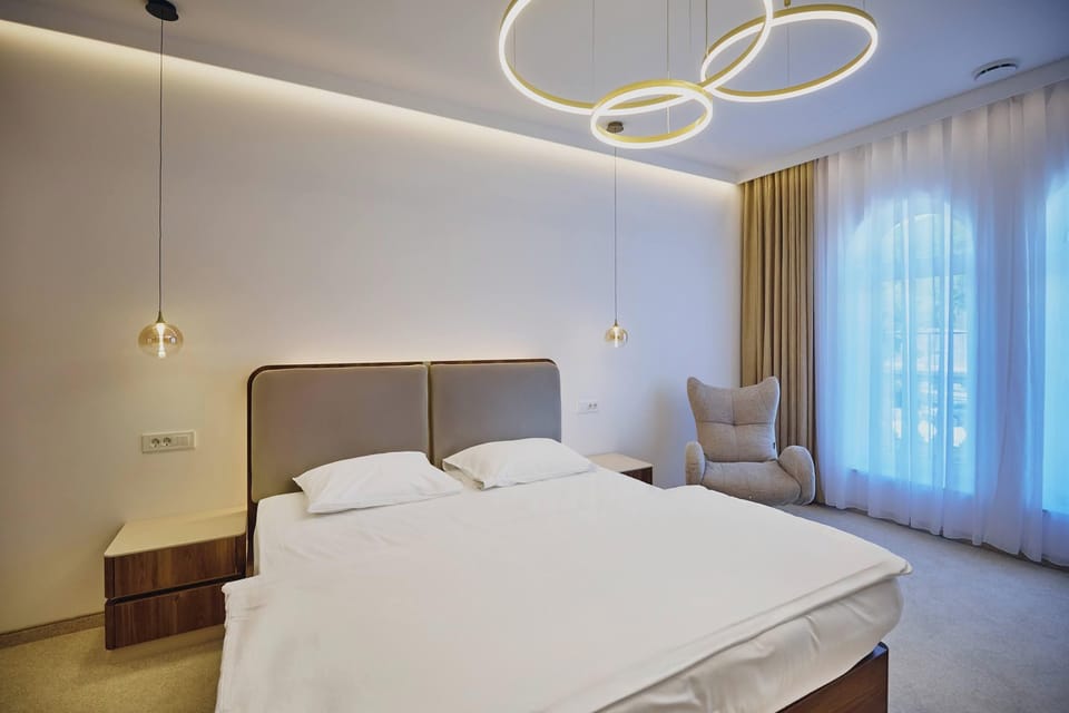 Superior Double Room | Minibar, in-room safe, desk, blackout drapes