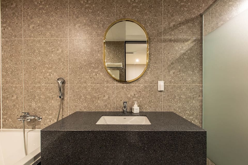Deluxe Double Room | Bathroom | Combined shower/tub, deep soaking tub, designer toiletries, hair dryer