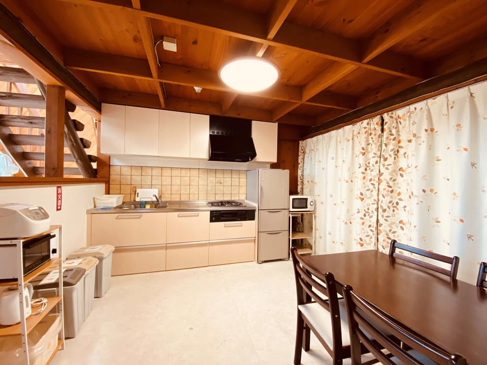 Two-Bedroom Cottage | Private kitchen | Full-size fridge, microwave, stovetop, electric kettle