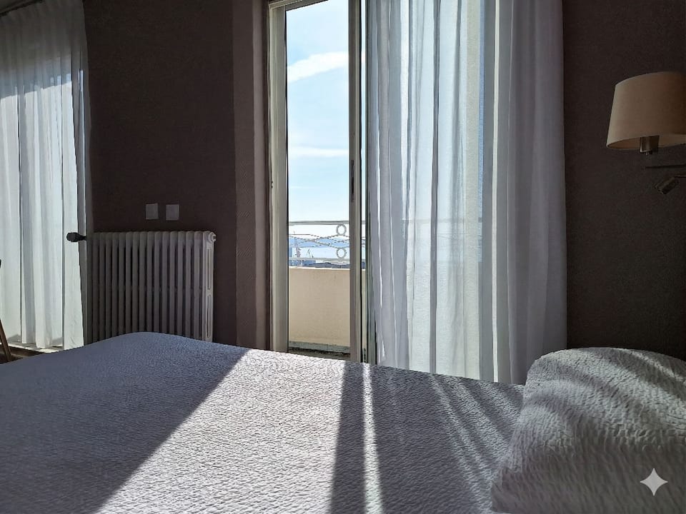Panoramic Double Room, Sea View | Desk, blackout drapes, soundproofing, iron/ironing board