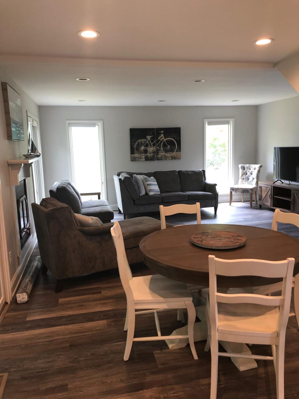 View from kitchen of dining room and into Living room.  