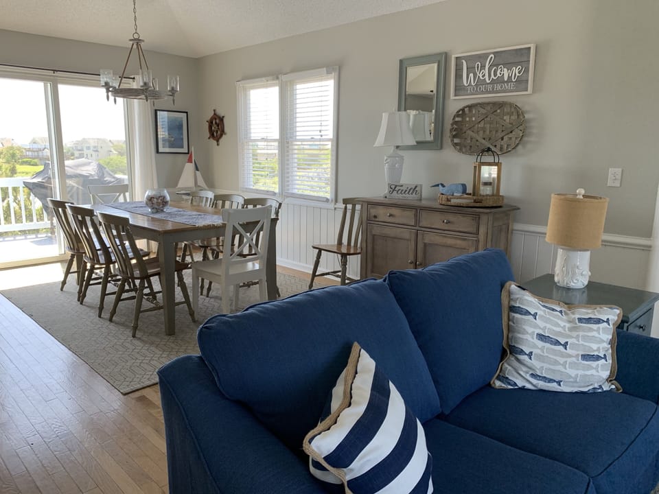 Open and inviting living and dining space upstairs.