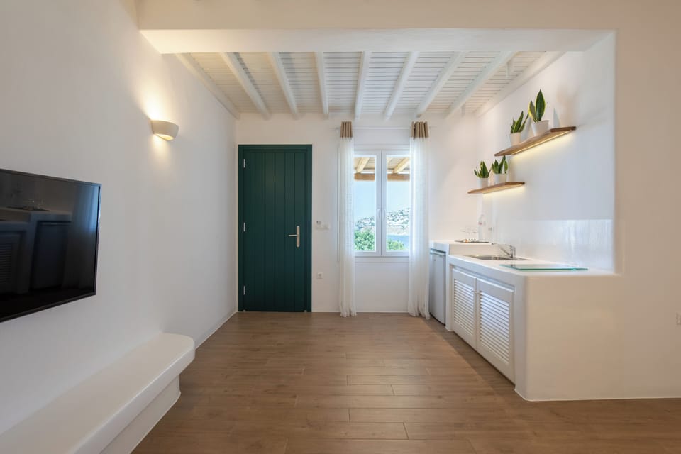 Superior Suite, 2 Bedrooms, Sea View | Living area | Flat-screen TV