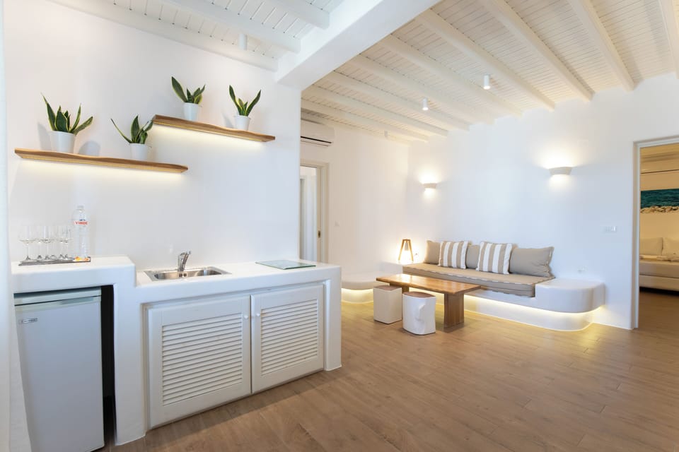 Superior Suite, 2 Bedrooms, Sea View | Living area | Flat-screen TV