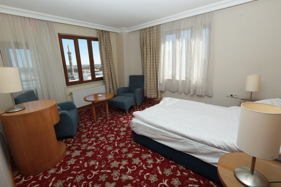 Desk, laptop workspace, free WiFi, bed sheets