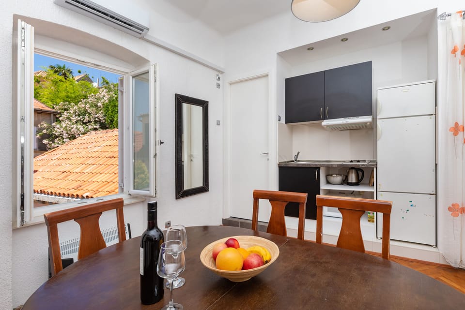 Standard Apartment | Private kitchen | Full-size fridge, microwave, stovetop, coffee/tea maker