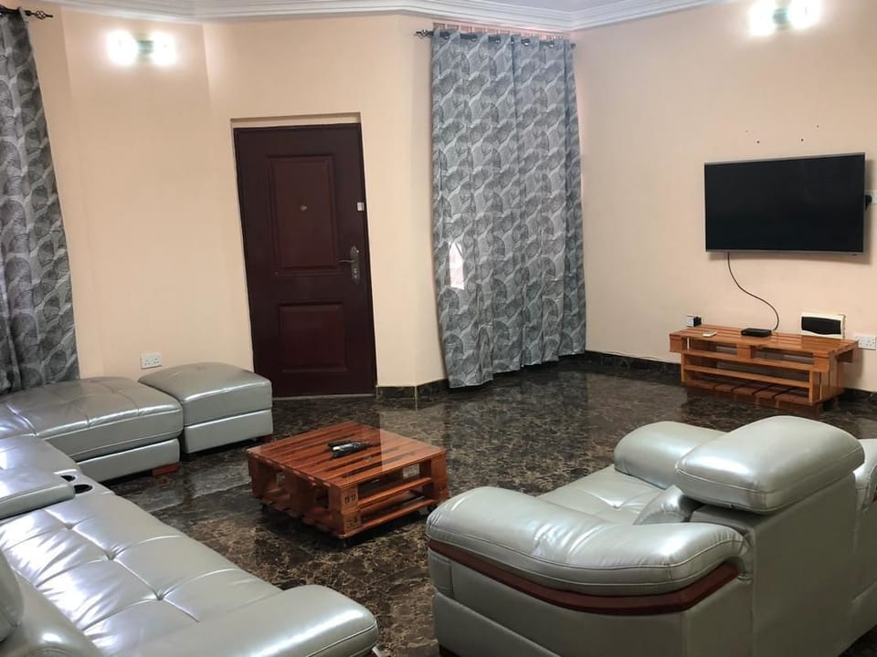 Apartment, 4 Bedrooms | Living area | TV