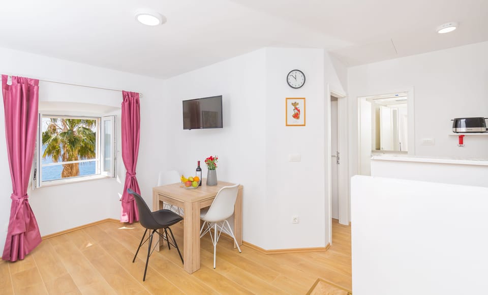 Standard Apartment | Living area | Flat-screen TV